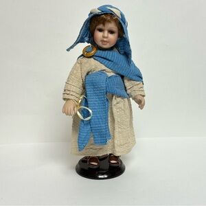 Seymour Mann Shepherd Doll with Stand 11 in.